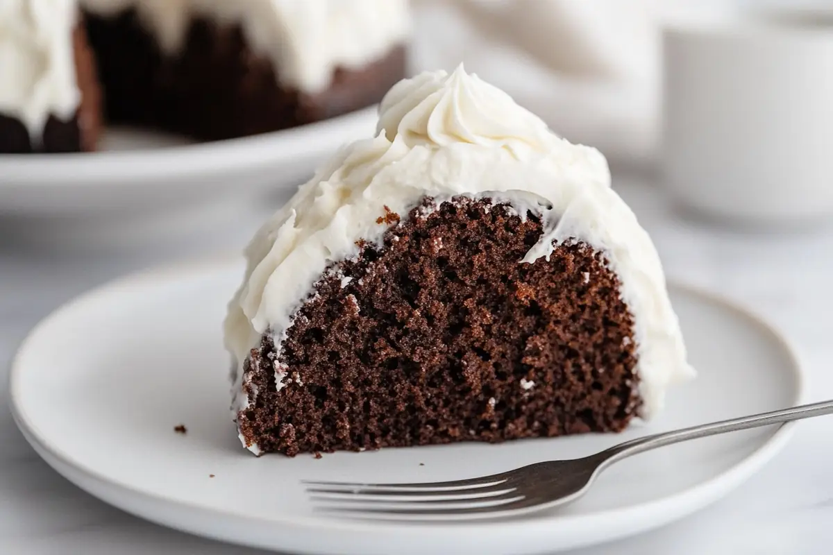 u6185574297 A close up shot of a slice of moist Nothing Bundt ef828c2f 1aeb 4dda 8297 f7da256c7f87 2 www.noryrecipes.com
